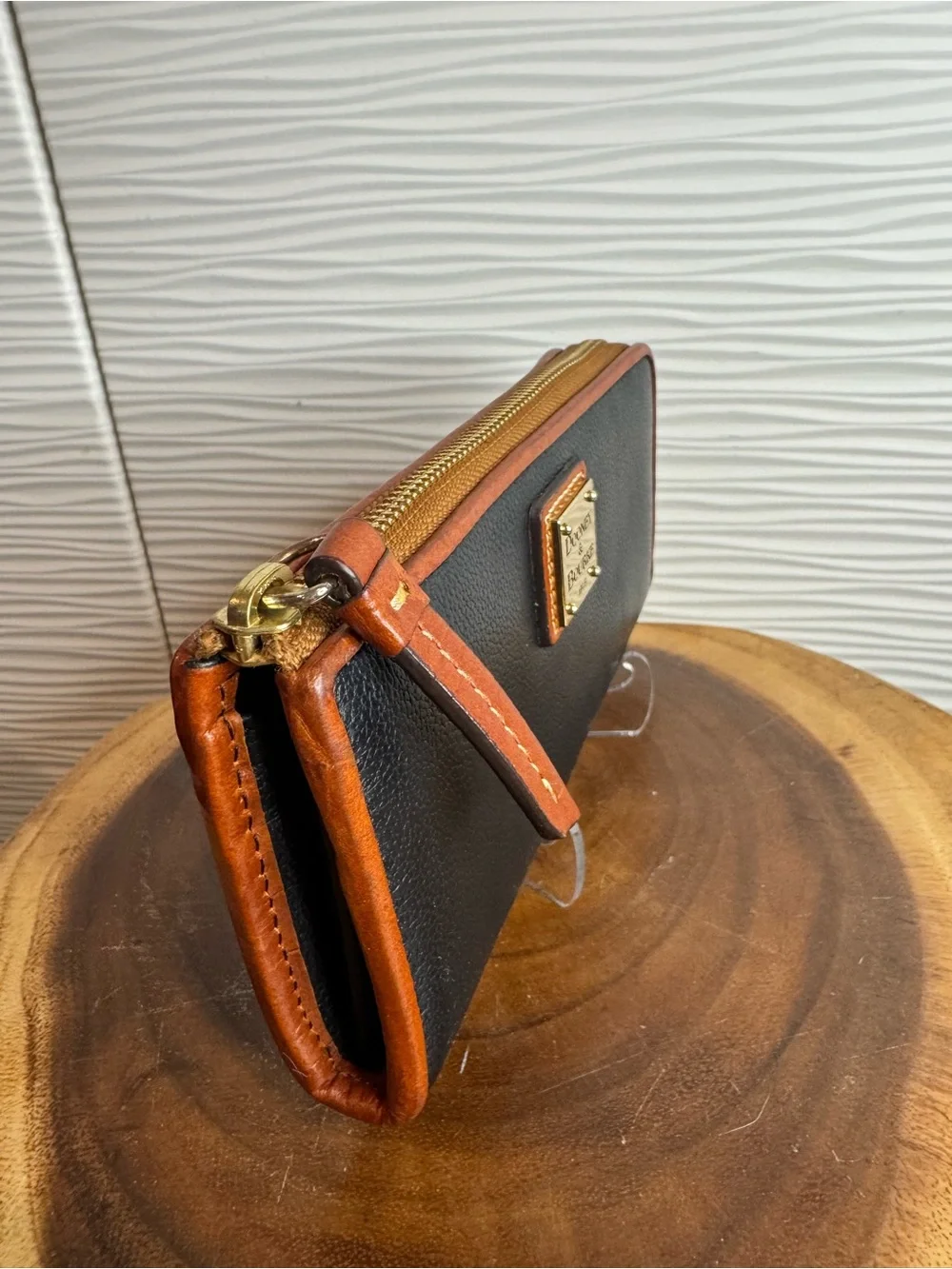 Dooney & Bourke Black Pebbled Leather Zip Wallet with Tan Trim and Logo Plate